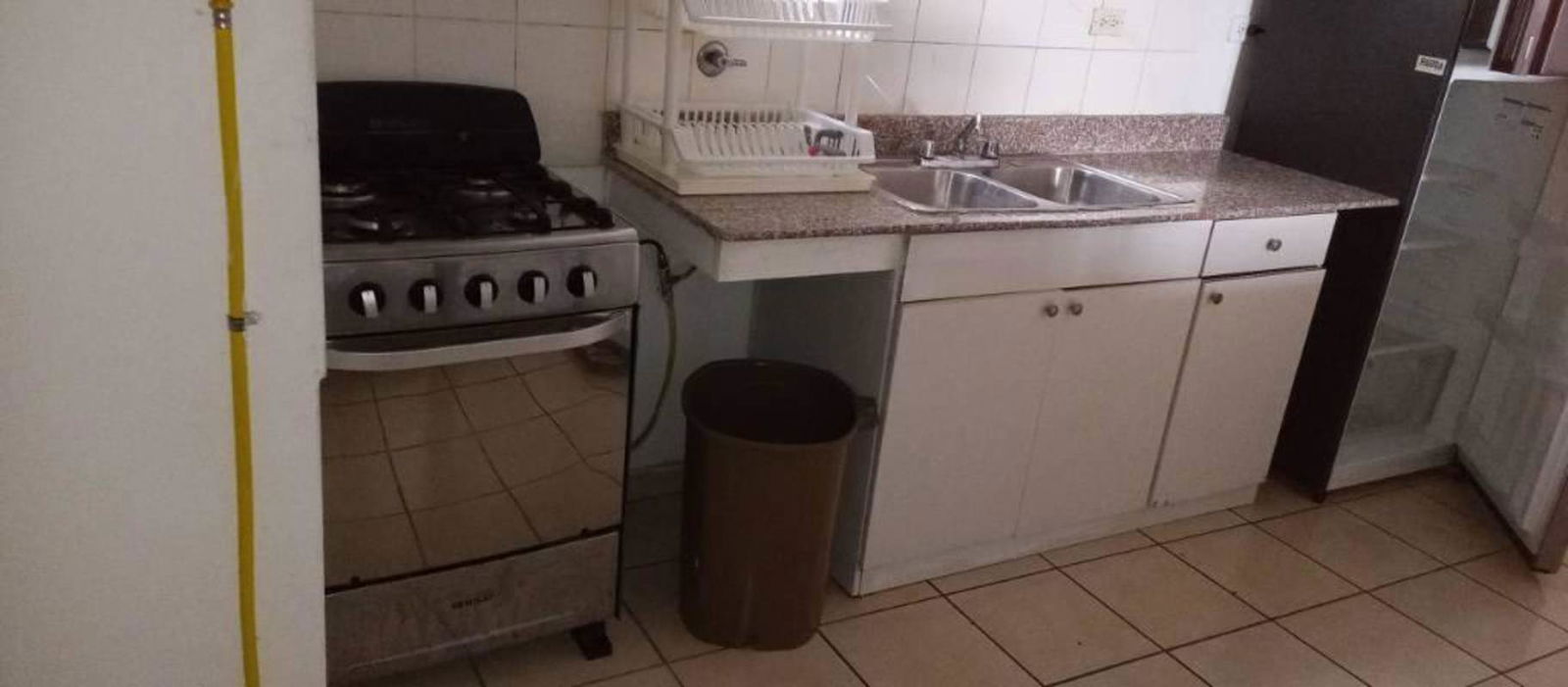 Equipped kitchen granite countertop dual sink gas stove in PH Vista Tower Panama City