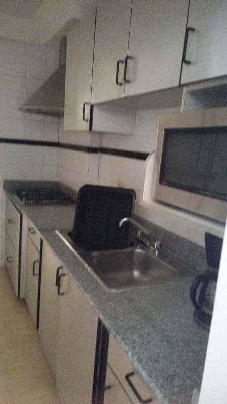 Simple guest bedroom with window, bed, light curtain PH Vista Hermosa Via Argentina Panama