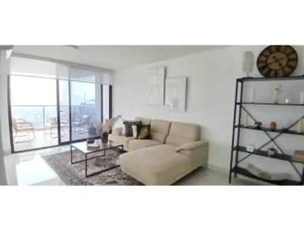 Bright living room with large windows, balcony access in PH Carreras Tower El Cangrejo Panama
