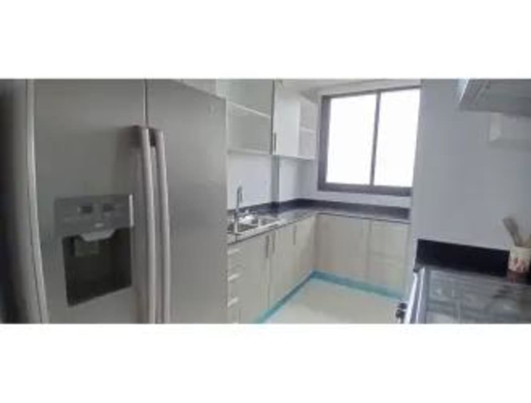 Contemporary kitchen granite counters stainless appliances PH Carreras Tower Panama