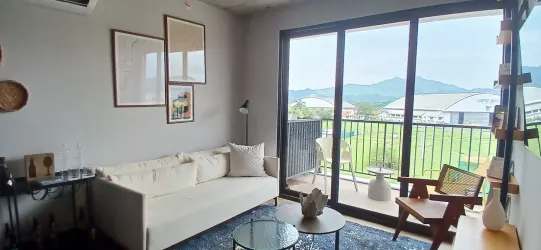 Modern bedroom with large window and mountain views in PH Centriqo Panama Pacifico