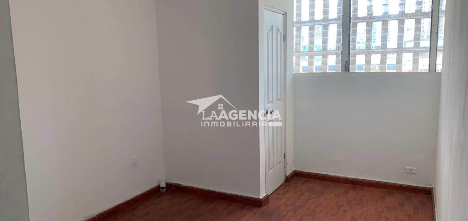 Bare utility room or small office space with ventilation window in CC Panama Tower