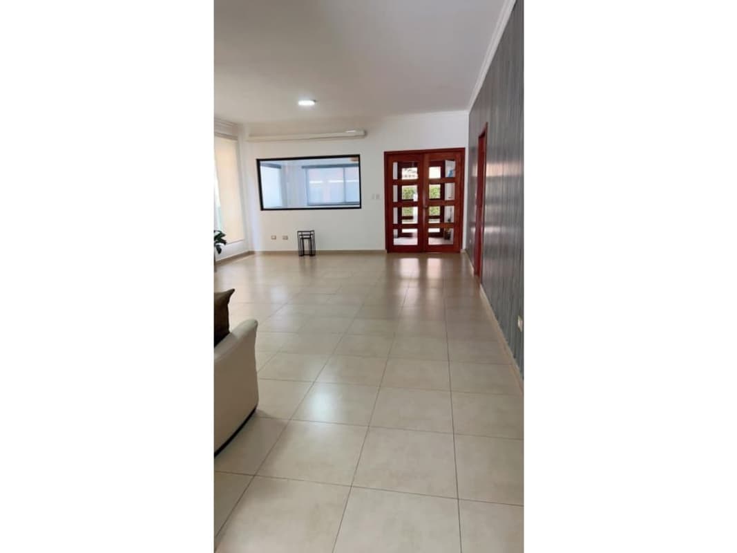 Modern kitchen with island, granite counters, stainless appliances in PH Doral Panama