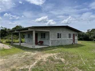 Unfinished rural house with wide covered porch near Penonomé Coclé Panama