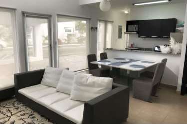 Bedroom with terrace access and natural light in Ibiza Beach Residences II Panama for sale