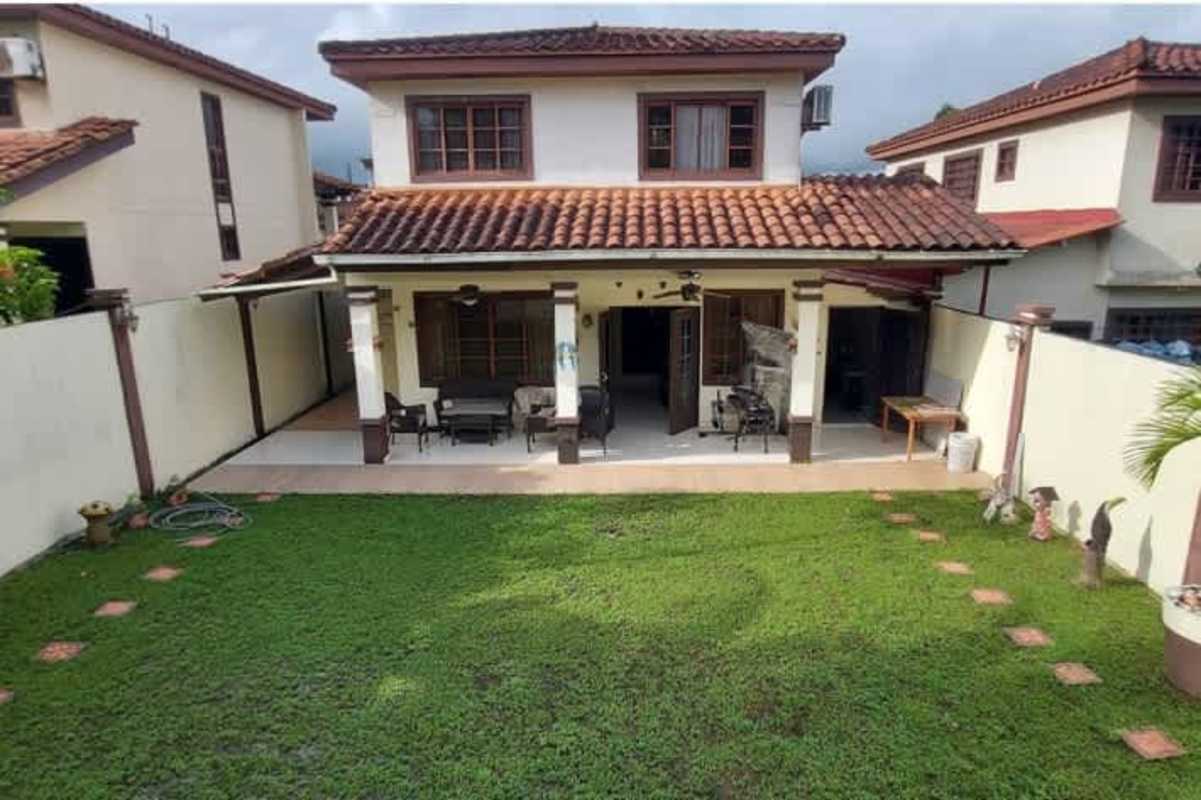 Entrance with guardhouse, signage Miradores del Lago in secure Las Cumbres Panama neighborhood