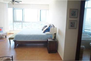 Modern bedroom with city view, ceiling fan, ensuite bathroom in PH Coronado Golf Panama