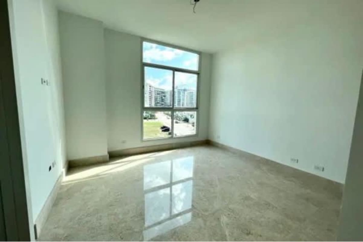 Contemporary kitchen with built-in appliances, island, and large window in Signature Panama