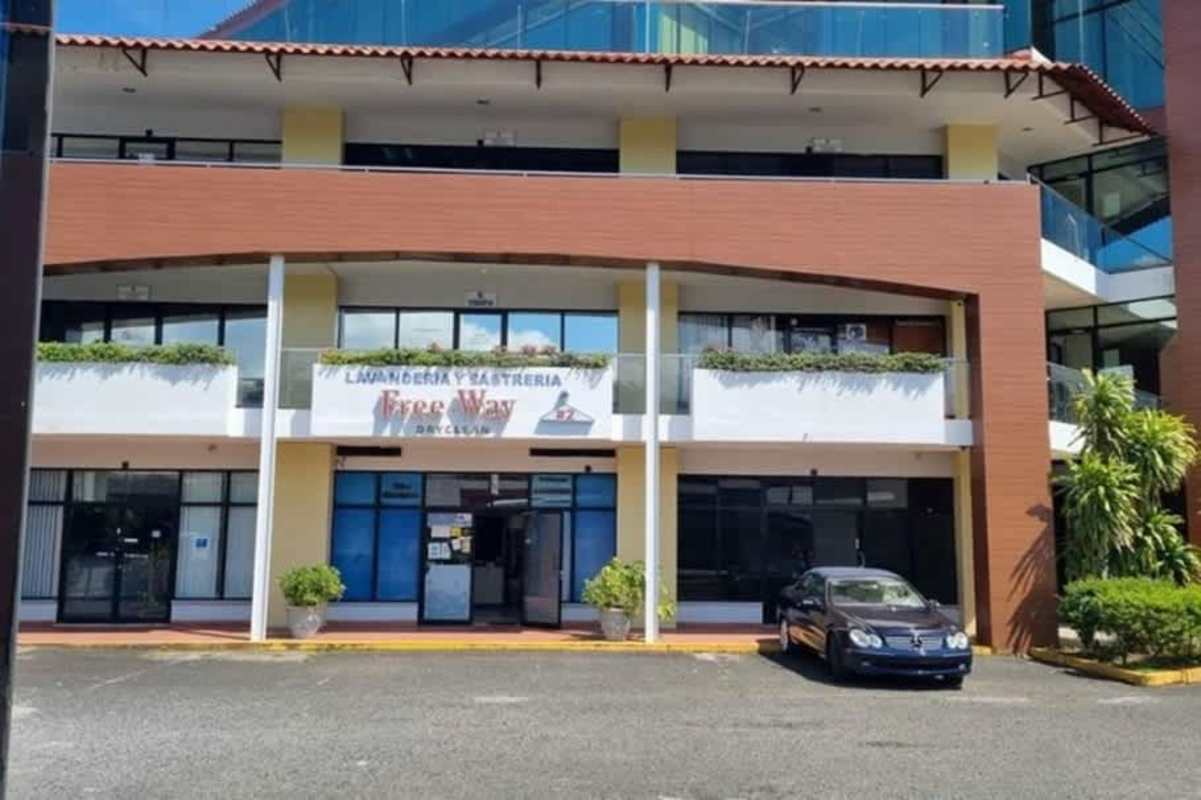 Exterior of Albrook Plaza shopping and office complex with multi-story commercial spaces Panama
