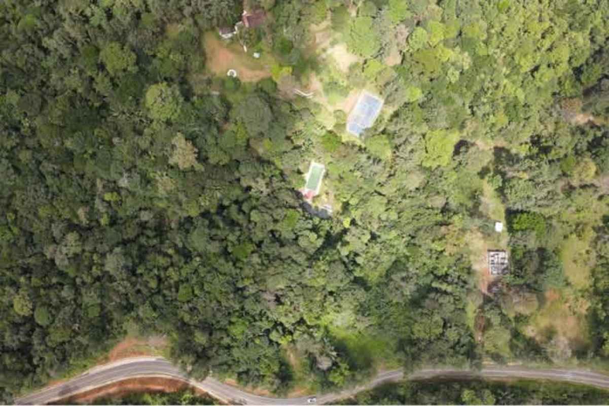 Grassy lot on mountain slope with panoramic sky views in Panama for sale