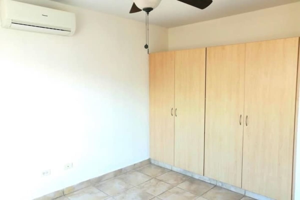 Minimalist kitchen area with window and bright finish PH Everest home
