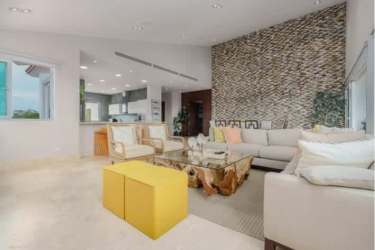 Large bedroom with sea view windows and en-suite bath Punta Barco Village penthouse Panama