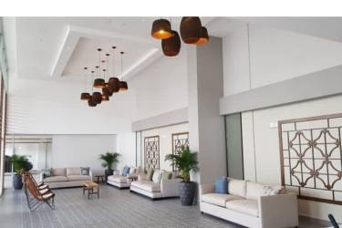 Elegant lobby with modern seating and decor at Royal Palm beachfront condos Panama