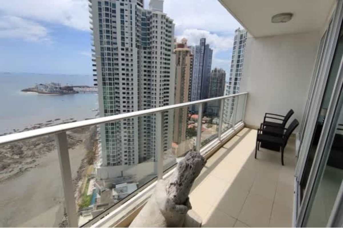 Private terrace with glass railing overlooking Pacific Ocean Trump Ocean Club Panama