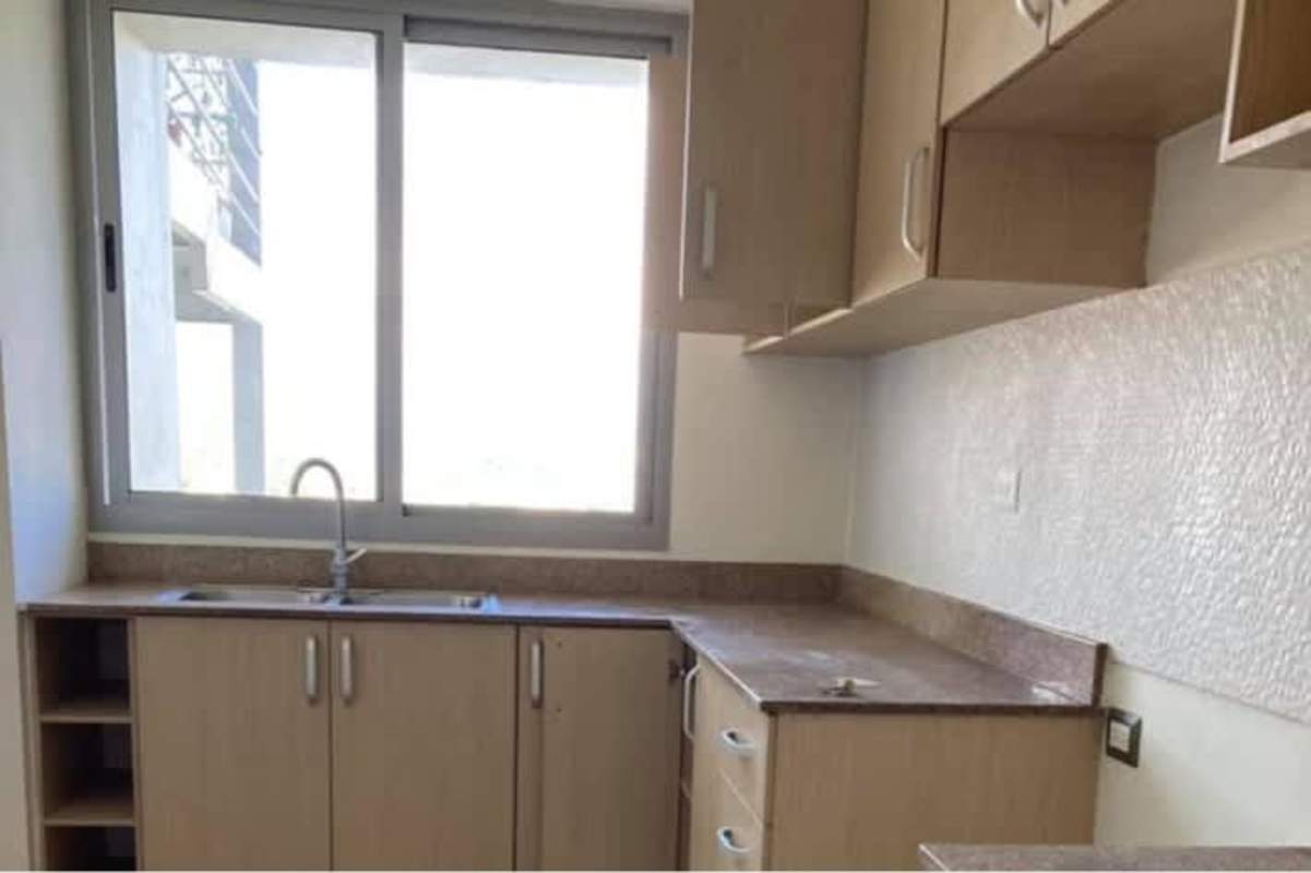 Modern kitchen with granite countertops, light wood cabinets in PH Rokas Betania Panama