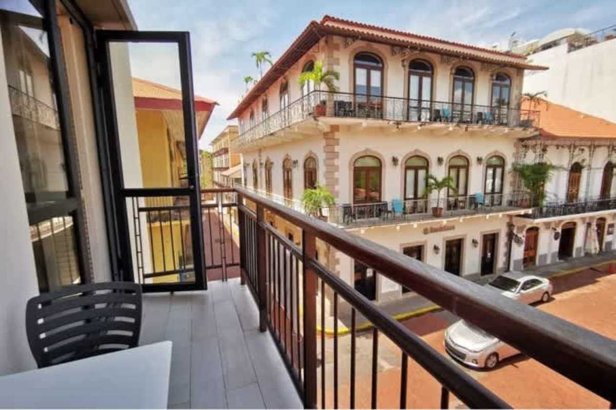 Elevator lobby with marble floors wooden stairs modern features PH Casco Viejo San Felipe Panama City