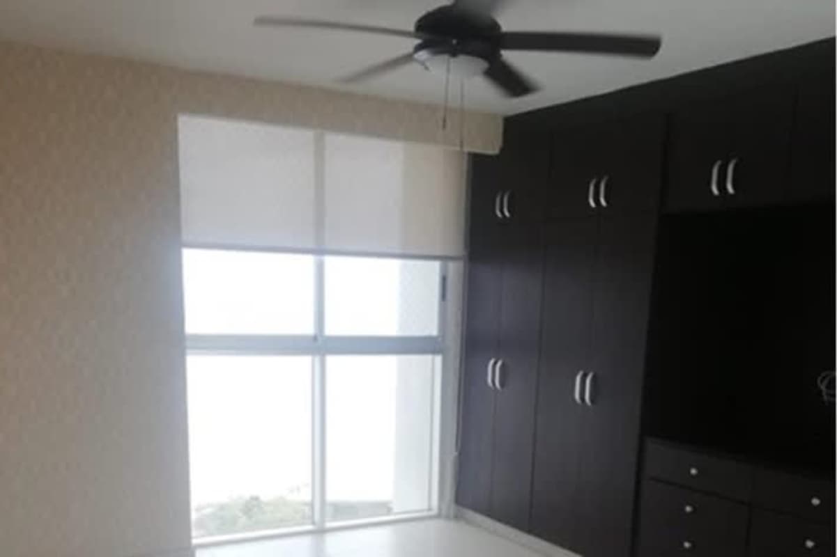 Elegant bathroom with granite countertop and glass enclosed shower PH Park City Panama City