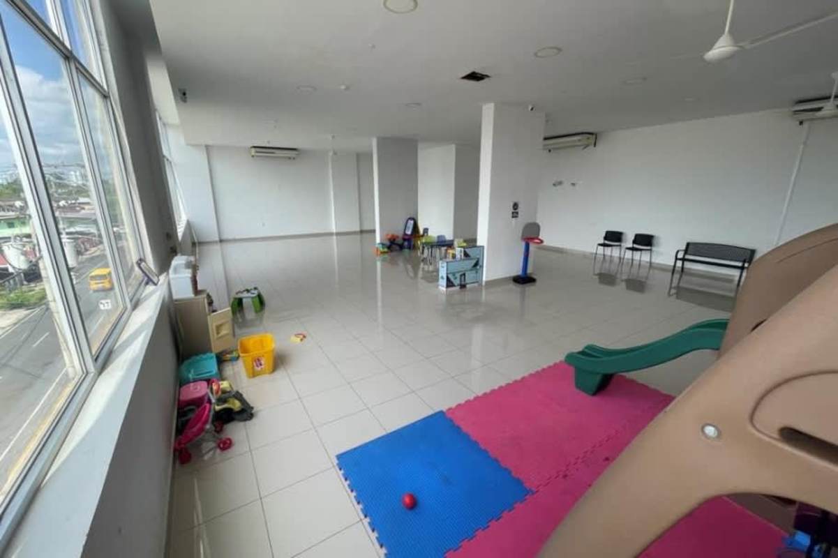 Children's playroom with toys and colorful mats PH Santa Elena Tower Panama City
