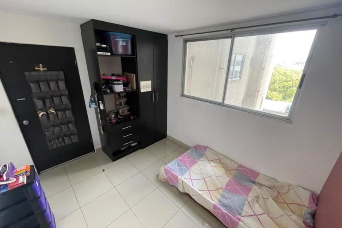 Minimalist bedroom with window and AC in affordable apartment Parque Lefevre Panama