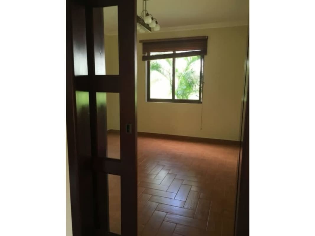 Grand entrance with balcony and landscaped driveway in PH Camino de Cruces Clayton