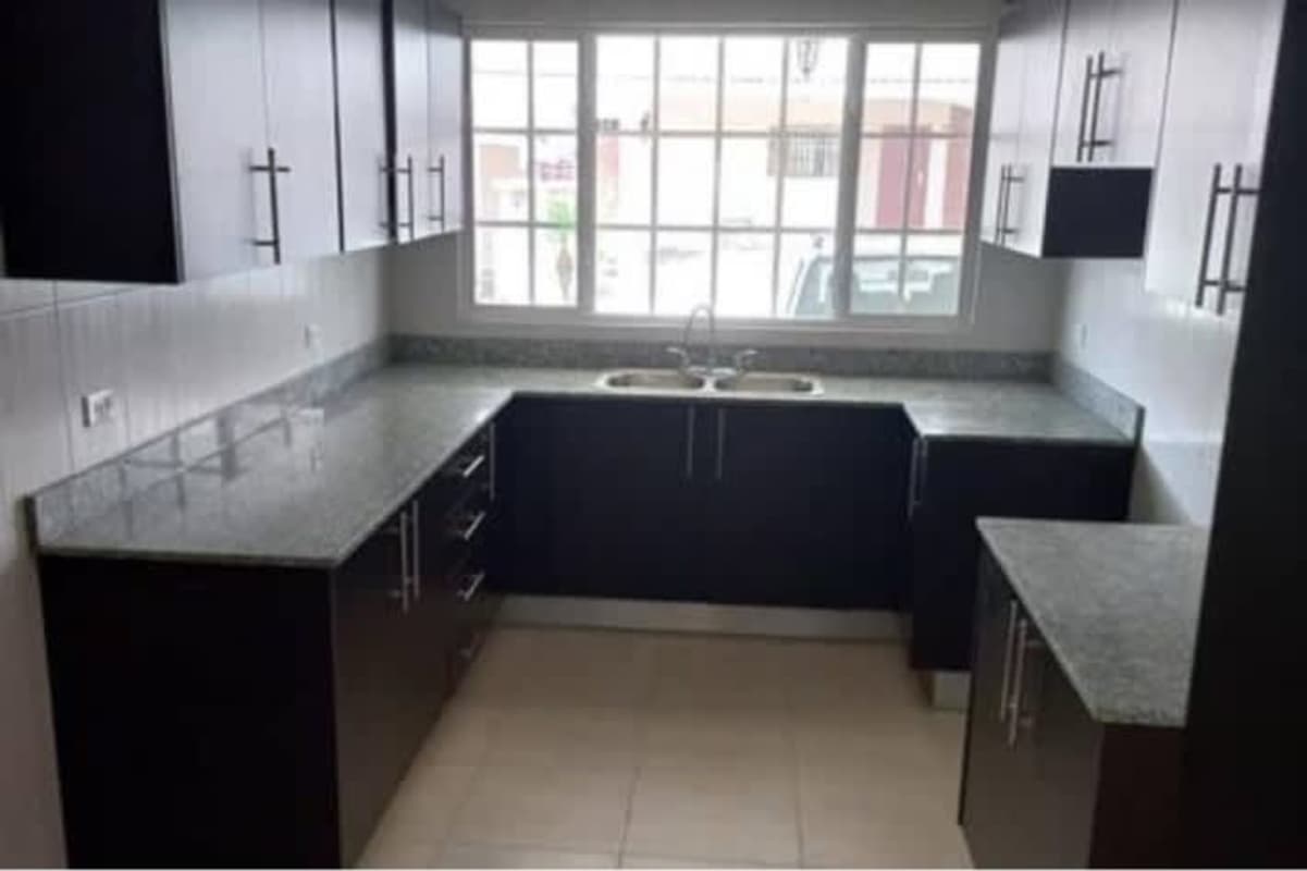 Empty living room ceramic floors AC ceiling fan modern door villa tiber brisas del golf panama