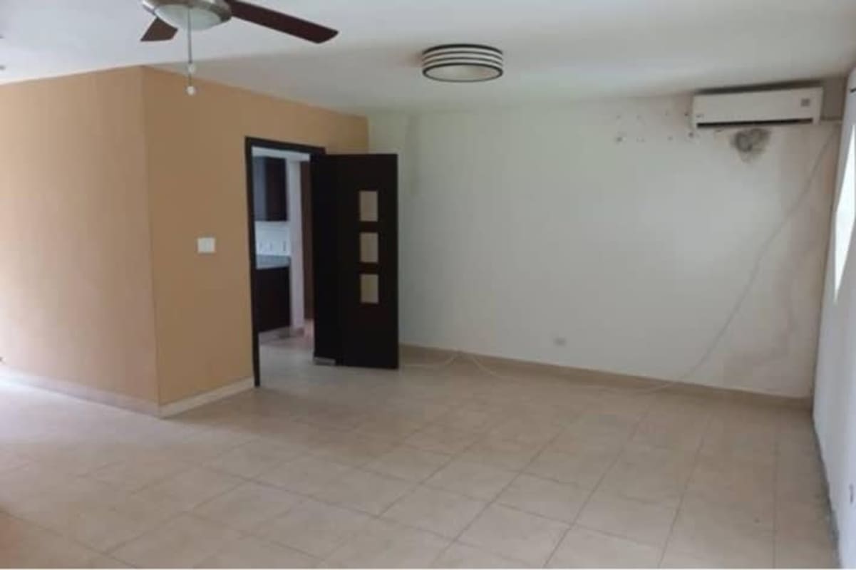 Interior view with stairs white railing tiled floors ceiling fan villa tiber brisas del golf panama