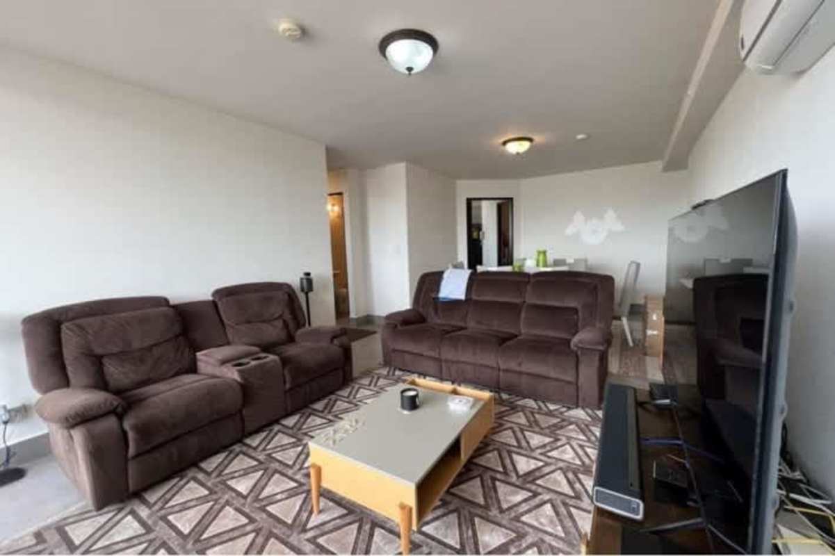 Spacious bedroom with large window and closet PH Parques del Carmen Panama City