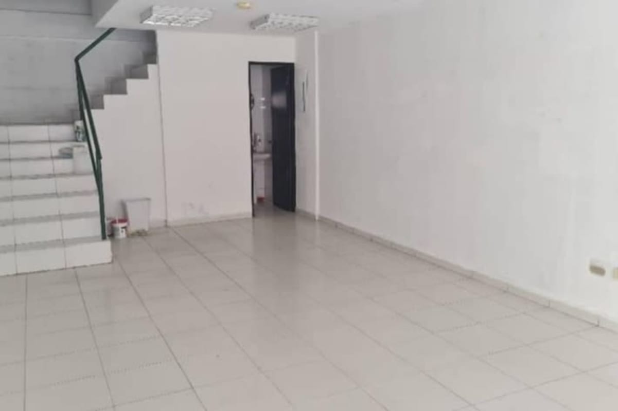 Large open interior area with tiled floors and modern stairs at PH Plaza Aventura El Cangrejo Panama