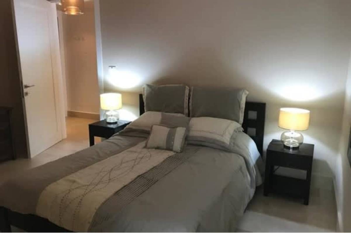 Bright secondary bedroom overlooking Panama skyline at PH BICSA Tower