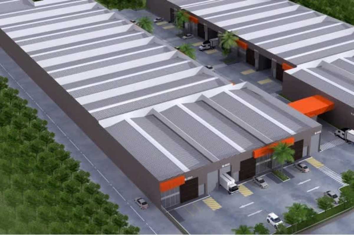 Front exterior industrial warehouse storefronts parking gated Parque Las Américas Panama