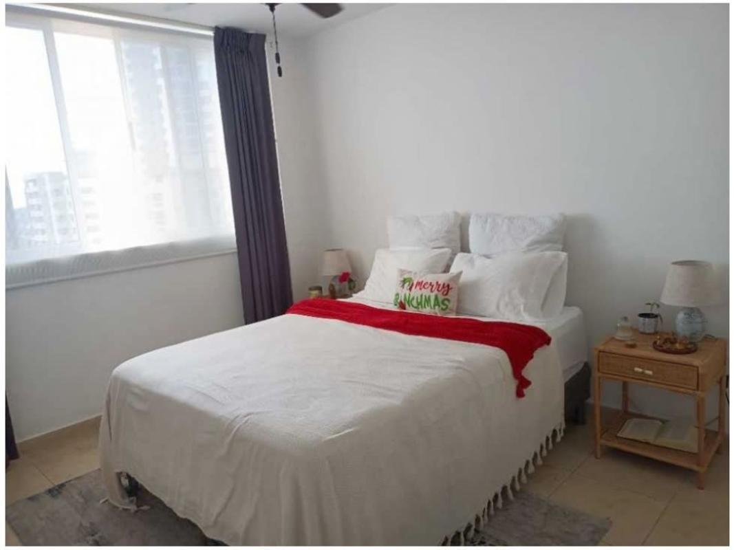 Modern bathroom with shower curtain, pedestal sink, tile wall PH RIM Tower Panama