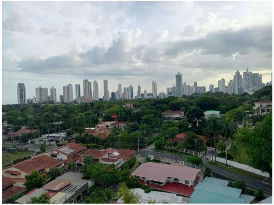 Outdoor swimming pool with terrace, lounge area at PH Tower Park Altos del Golf Panama City