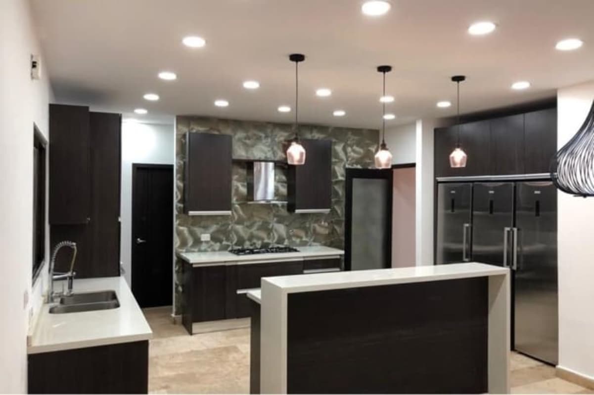 Luxury bathroom with marble walls, bathtub, glass shower, double sink in Sunset Coast Costa Sur Panama