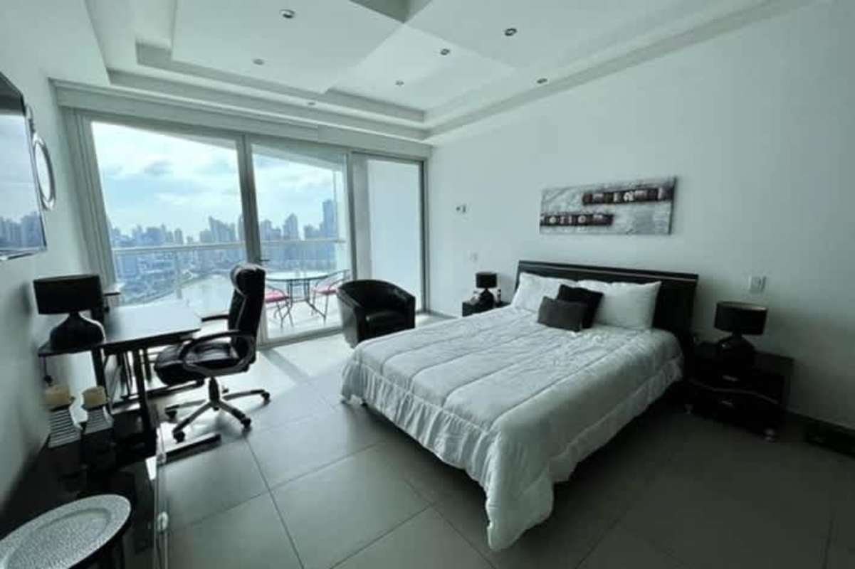 Spacious apartment balcony with sea views and seating area at PH BICSA Panama