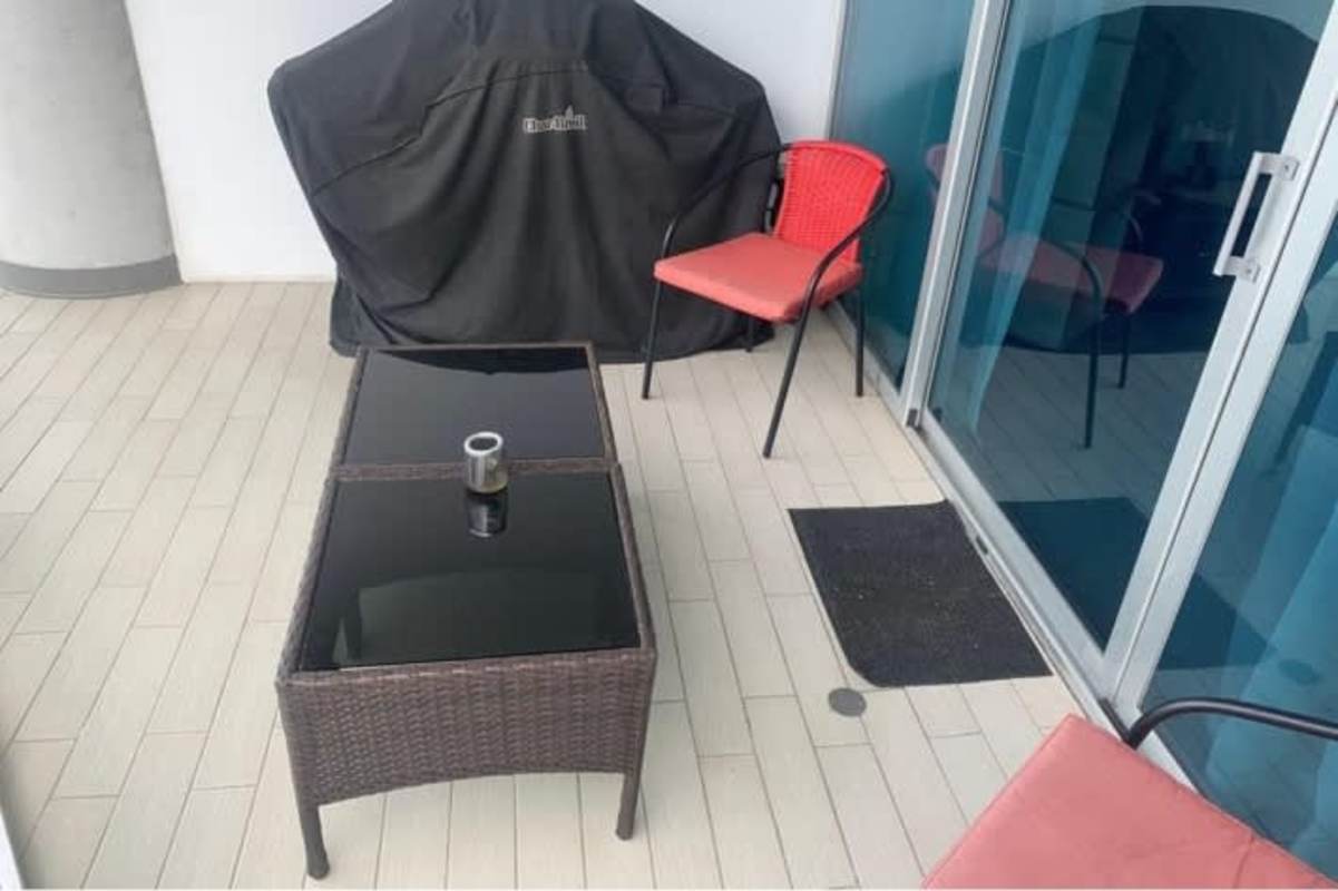 Second bedroom with balcony ocean view and modern furnishing in PH BICSA Financial Center Panama City