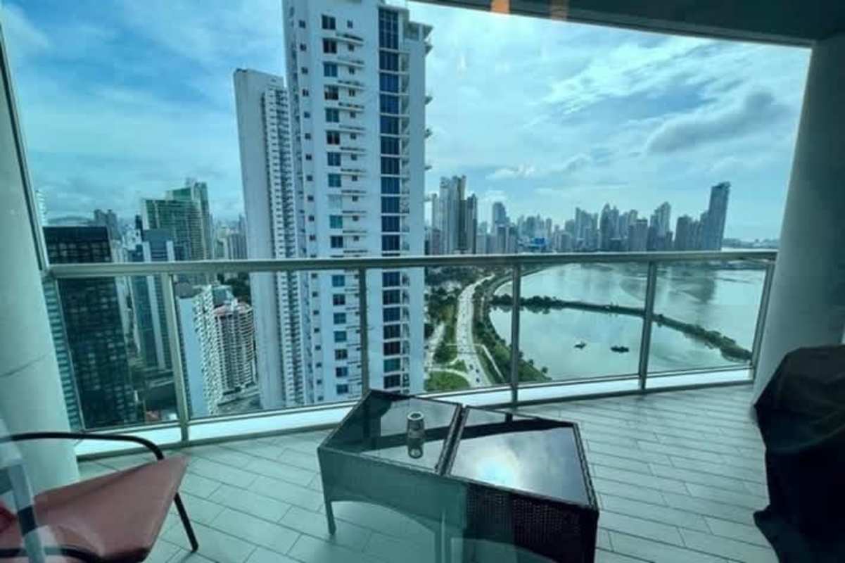 Balcony terrace with Pacific Ocean skyline view at PH BICSA Financial Center Panama City apartment