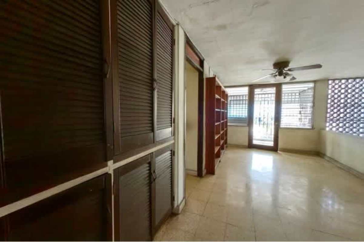 Bright bedroom with built-in closet window in duplex house Coco del Mar