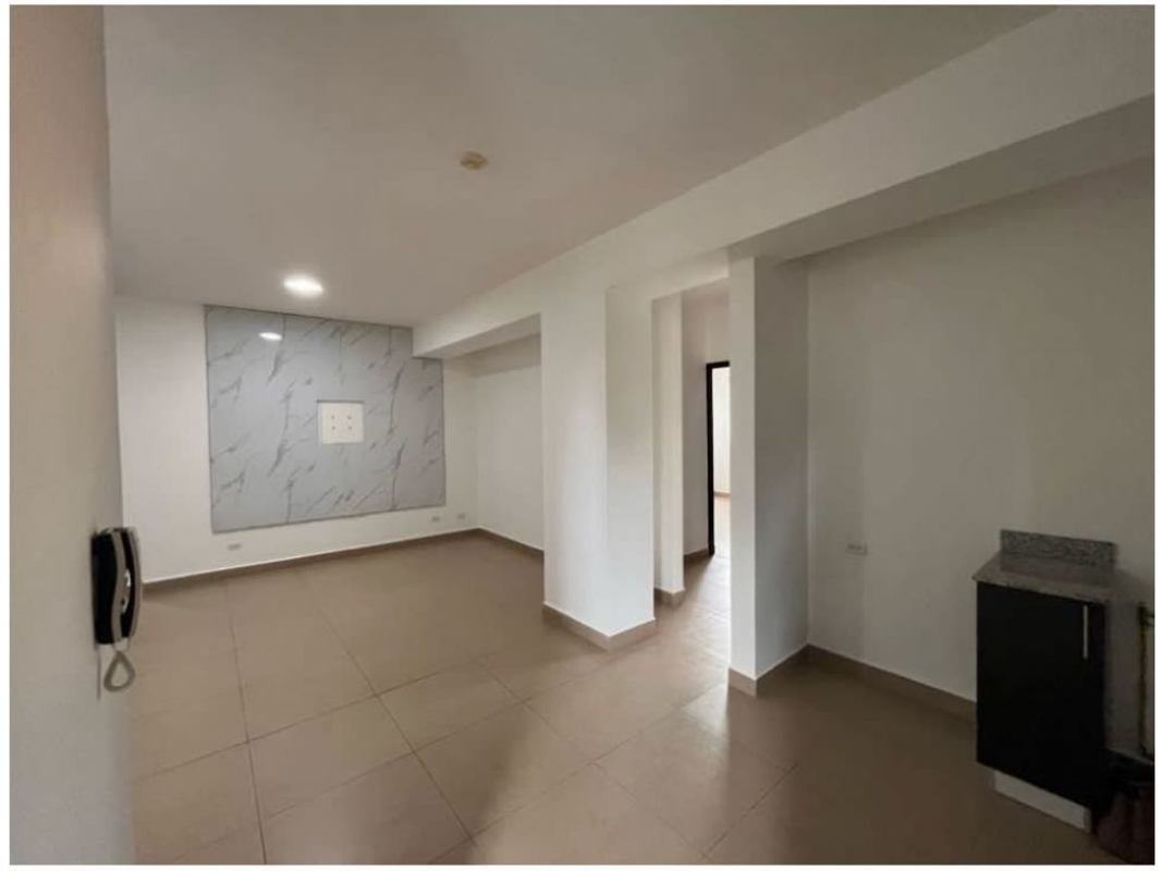 Modern bathroom with pedestal sink and glass enclosed shower in PH Ceceda Panama City