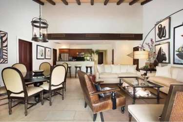 Bright open living dining with exposed beams at luxury Buenaventura Panama villa for sale
