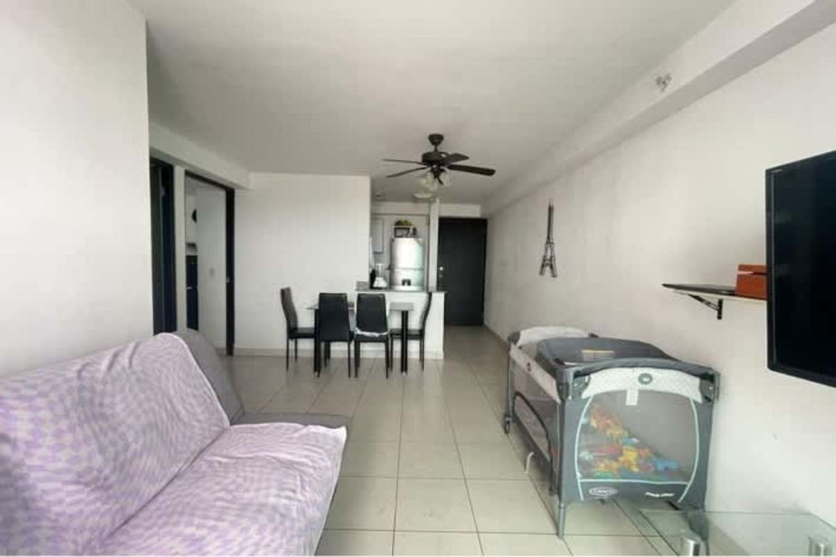Laundry room with stacked washer dryer and granite counter PH Parque Lefevre Panama City