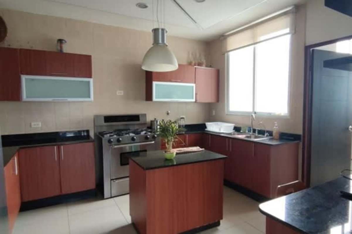 Spacious granite kitchen island with appliances PH San Francisco Bay Panama