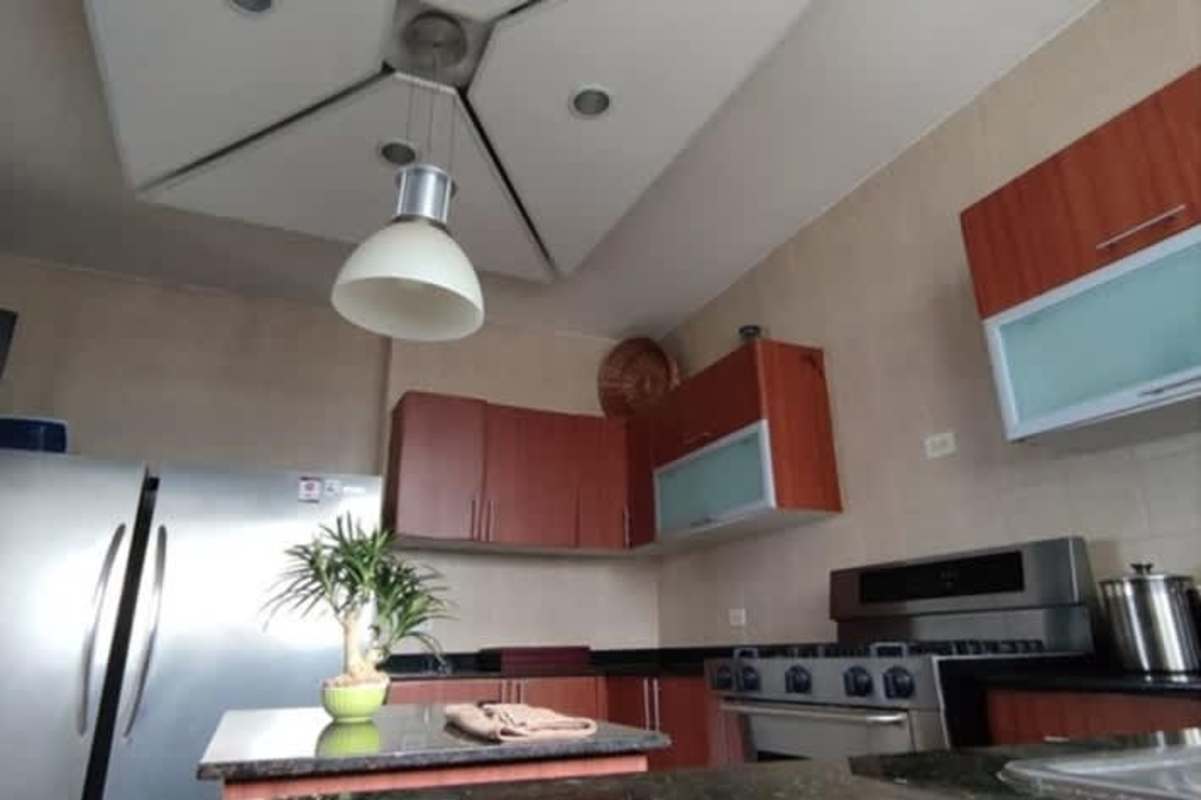 Modern kitchen with workspace, island and large window PH San Francisco Bay