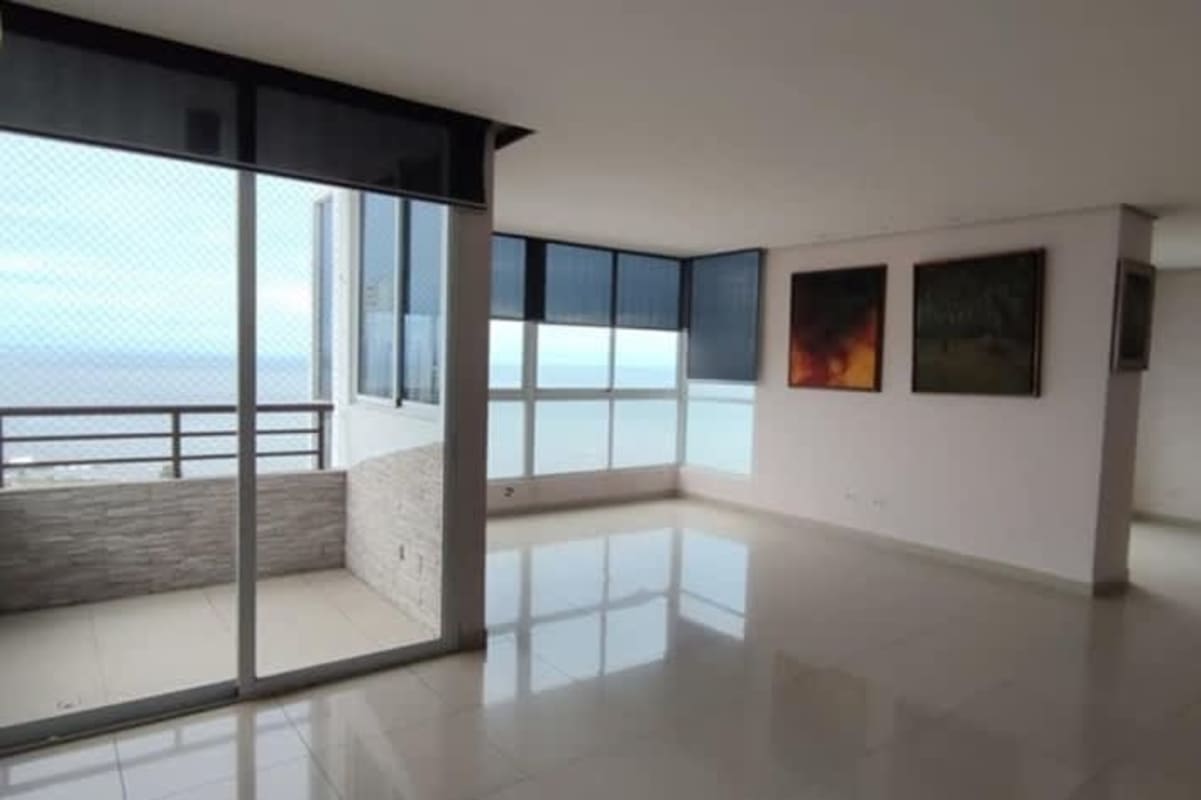Living room with glass wall sea city ocean views PH San Francisco Bay Panama
