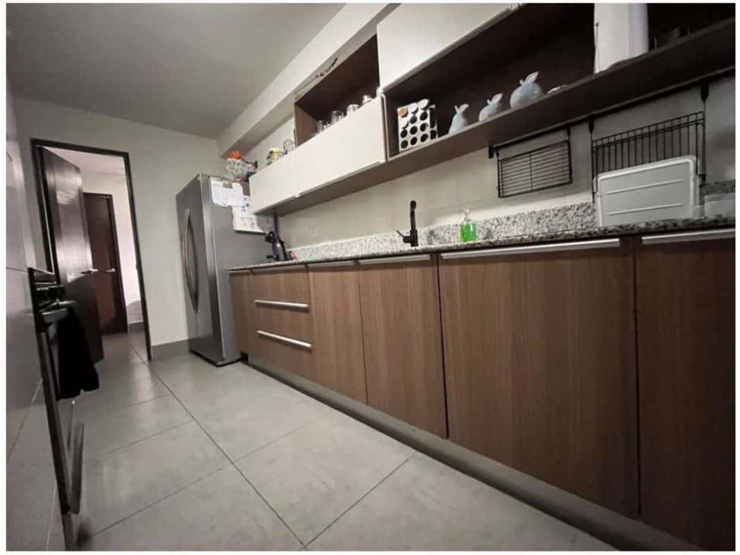 Bedroom with tiled floor, split AC, built-in closet, and natural light in PH Parque del Carmen Panama City