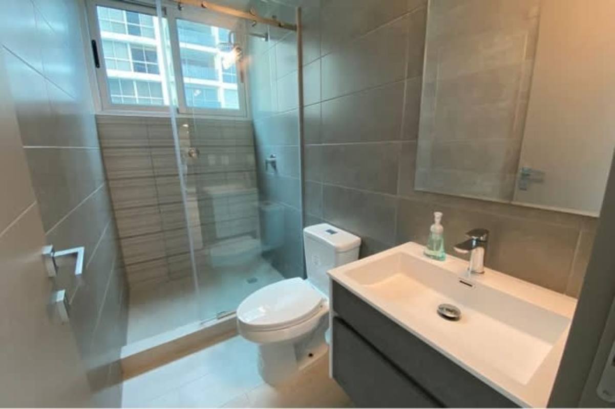 Modern kitchen with stainless steel appliances and sleek cabinetry in PH BICSA Tower apartment Panama City