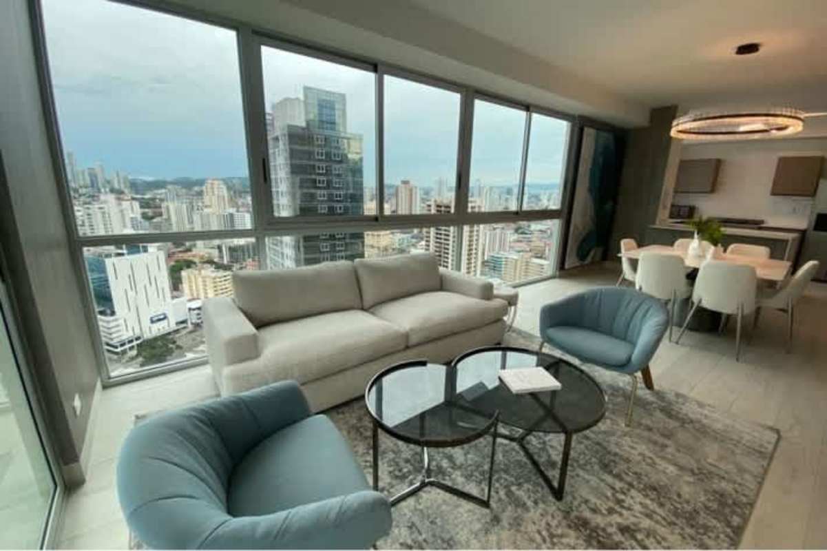 Bright bedroom featuring large windows with city view in PH Le Mare Tower Obarrio Panama