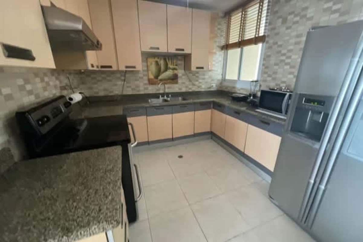 Modern bathroom with granite countertop vanity, glass shower in PH Costa Pacifica Panama