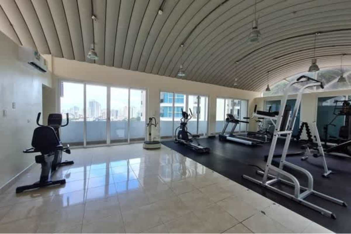 Fully equipped gymnasium at PH Belview Tower Betania Panama with cardio and weights equipment