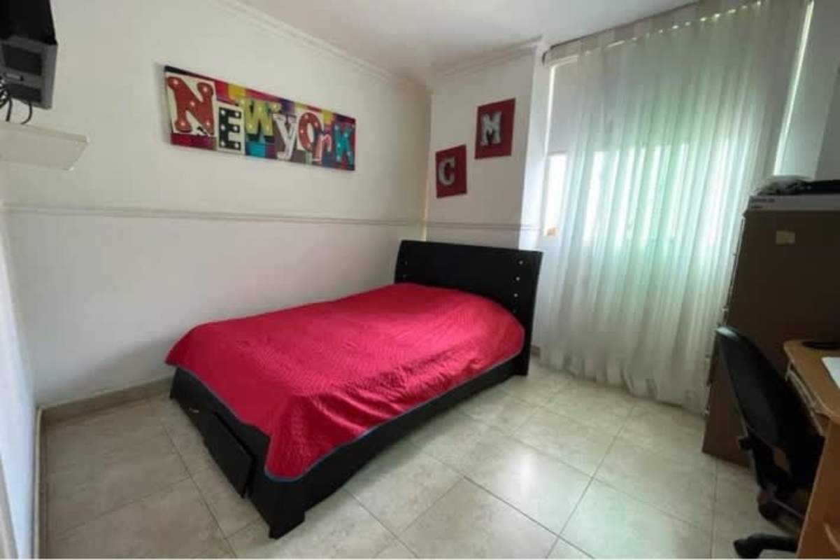 Bedroom with large window and ample natural light in PH Mystic Point Punta Pacifica