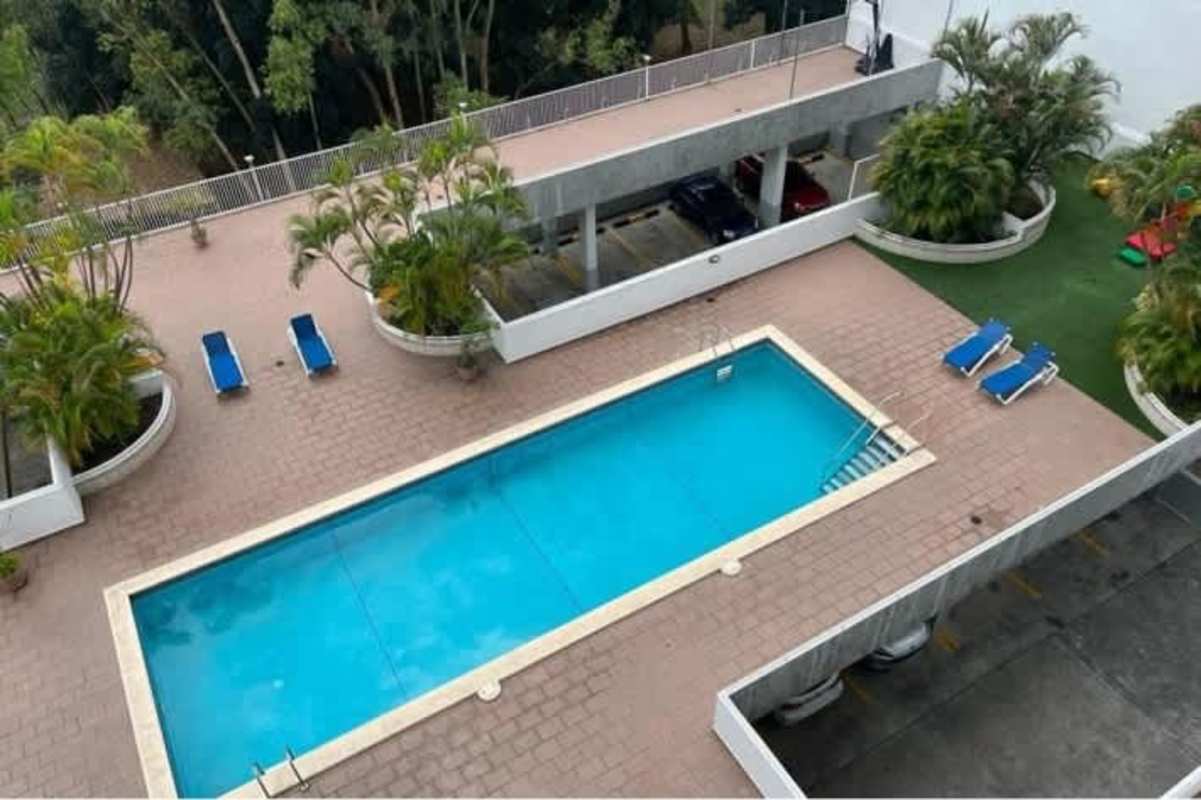 Spacious living room with large sliding glass doors and balcony view in East Coast Tower Panama